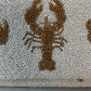 LOBSTER CLUTCH WHITE AND GOLD